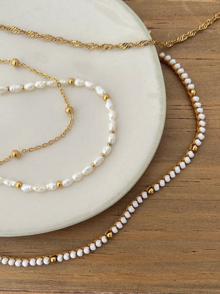 Cavigliera mini perle di fiume e balls dorate