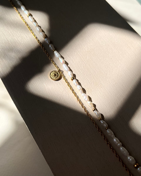 Girocollo micro perle di fiume e punti luce