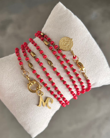 Collana lunga rossa con pendenti