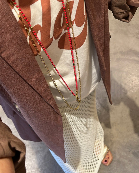 Collana lunga rossa con pendenti